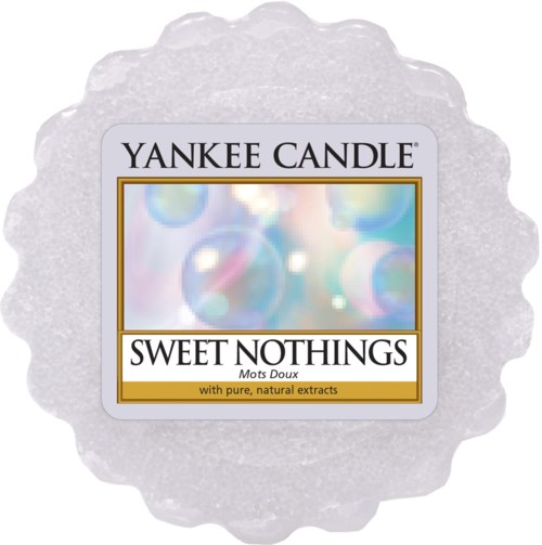 En Yankee Candle-vaxsmältare med märket 'Sweet Notions' med färgglada, suddiga cirkelmönster och naturliga extrakt.