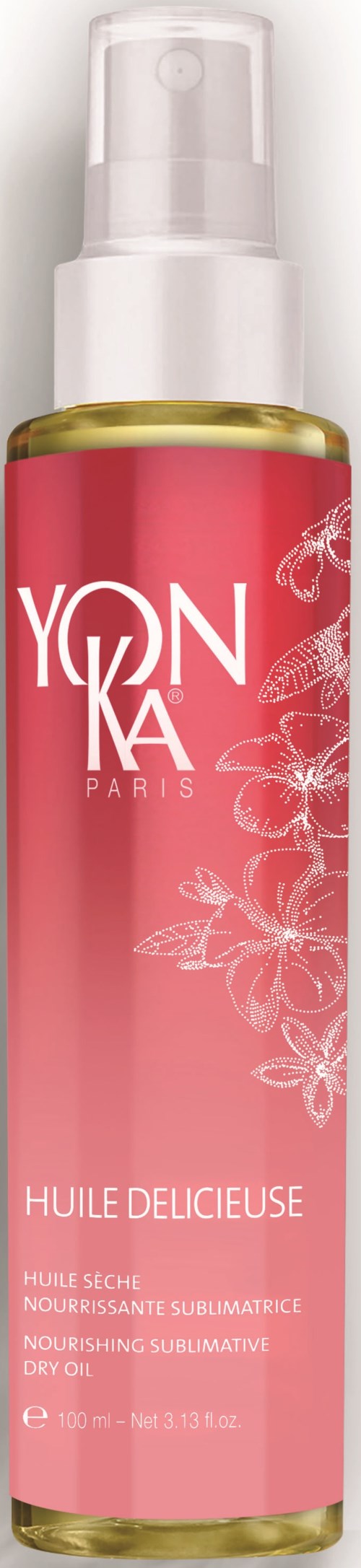 En rosa flaska med vitt och gulddetaljer, märkt "Yonka Paris" och "Huile Delicieuse." Den har en pump.