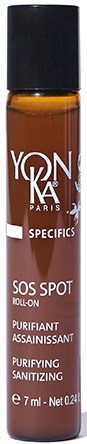 Pieni rullopullo, jossa ruskea neste, merkiltään YONKA PARIS, SOS SPOT, kasvojen puhdistukseen ja desinfiointiin.