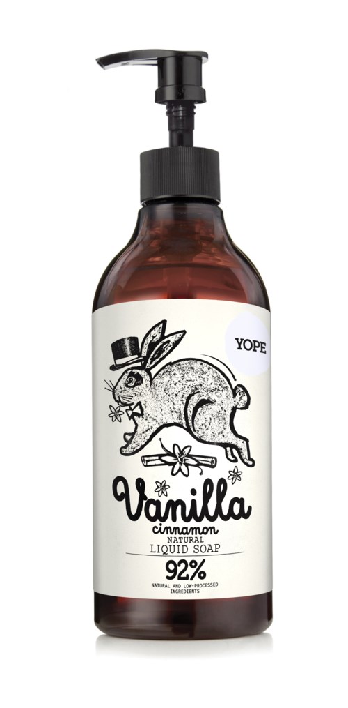 Flytande tvålflaska med en hund som bär en hatt, märkta vaniljsmak och 92 % naturliga ingredienser.