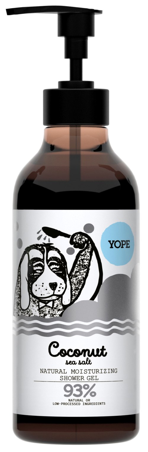 En schampo-flaska med pump, har en hundillustration och kokosdoftetikett, återfuktande produkt.