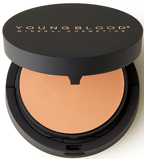 A round black compact with beige powder, labeled "Young Blood Mineral Cosmetics," with an open lid showing the makeup inside.