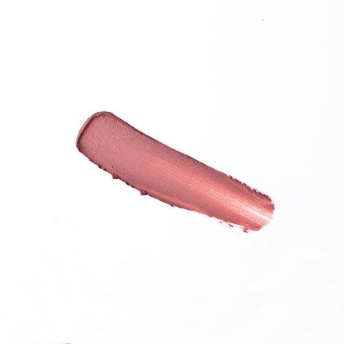 En rosa makeup-spot sprejad på vit bakgrund.