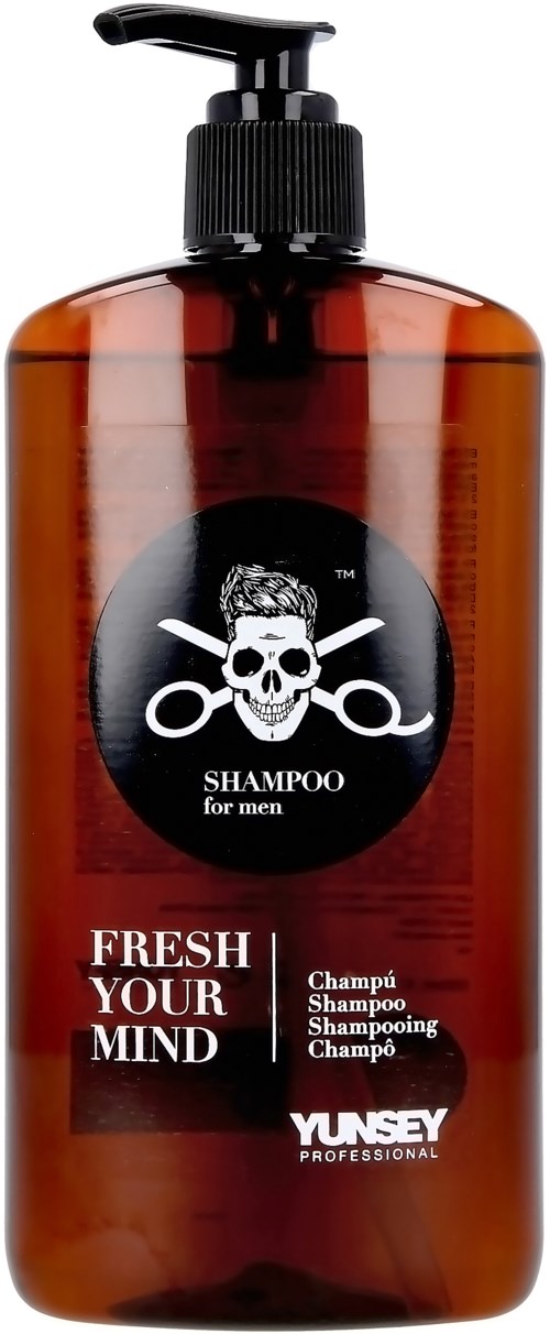 En brun schampofläsk med svart pump, dödskallelogga och text för herrschampo, märkt "FRESH YOUR MIND".