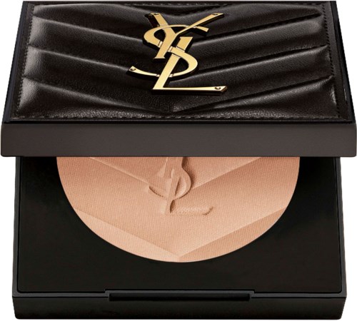 A black clutch with gold YSL logo, opening to reveal beige blush inside.