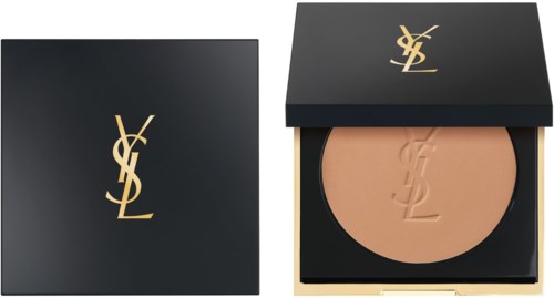 En svart box med guld YSL-logga och löspuder inuti. Boxen har ett stängt lock och en synlig rund puder.