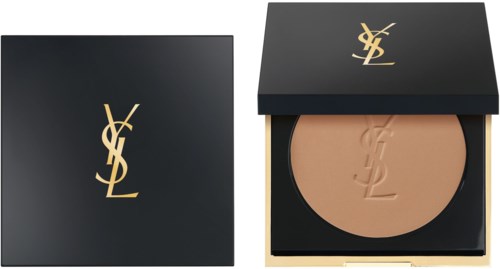 A compact with YSL logo, containing beige pressed powder, black box, and gold accents for makeup.