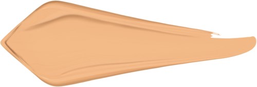 Beige tai ruskea meikkituote, todennäköisesti meikkivoide, levitetty pisaran muotoon.
