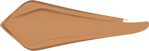 Ett beigefärgat smet av krämig substans, format som ett tårdryck eller lång oval.