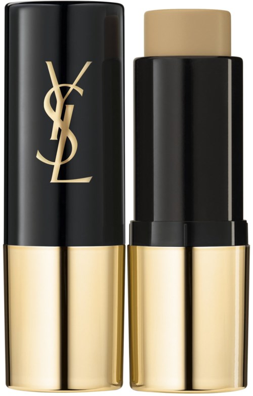 En YSL-makeupstift med svart och guld förpackning och en beige produkt inuti.