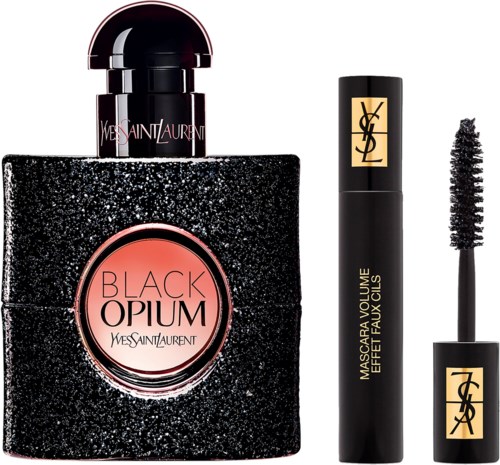 Black Opium parfymflaska och YSL mascara. Flaskan är svart med glitter, och mascaran är svart med guldkapyt.