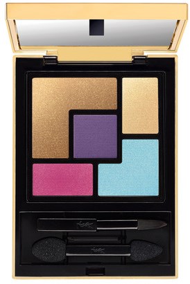 A makeup palette with six colorful shades in a black case, including purple, pink, blue, beige, and brown.