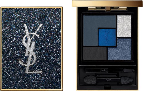 A blue and silver eyeshadow palette with a Saint Laurent glittery cover and various eyeshadow shades inside.