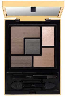 A makeup palette with four eyeshadow shades, a mirror, and two small applicator brushes inside a black case.