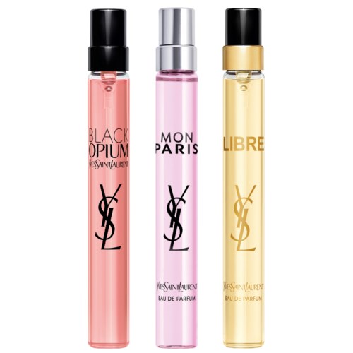 Tre Yves Saint Laurent parfymeflasker med svarte, sølv og gull hetter og rosa, lilla og gule væsker.