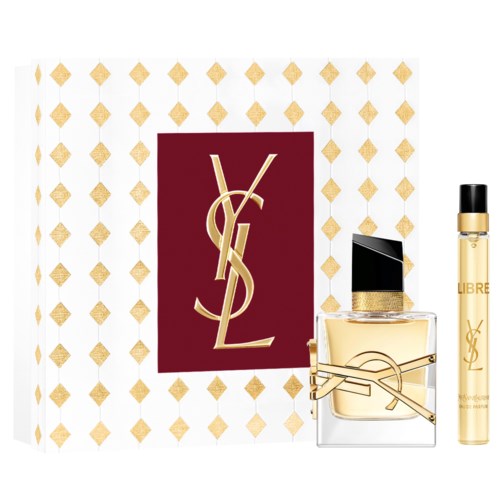 YSL-logotyp på röd kort, YSL-parfymflaska och roller på ett mönstrat vitt och guld bakgrund.
