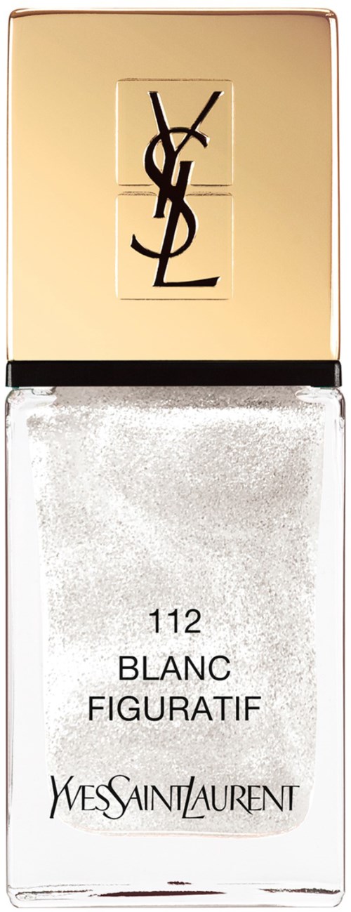 En Yves Saint Laurent nagellackflaska med guldlock och vit nagellack.