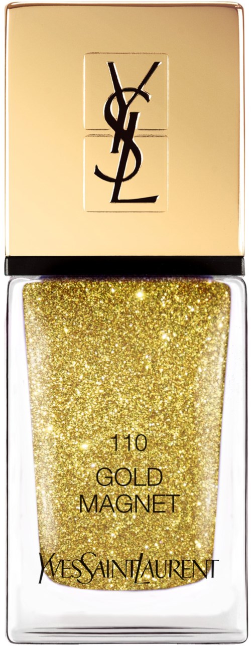 Gullfarget neglelakk i en rektangulær flaske med gullhette, merket '110 Gold Magnet' av Yves Saint Laurent.