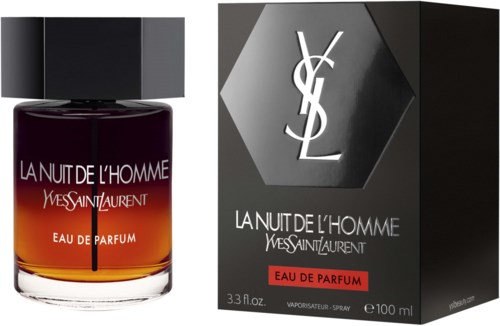 Yves Saint Laurent parfumflesje naast de doos, met "La Nuit de L'Homme".