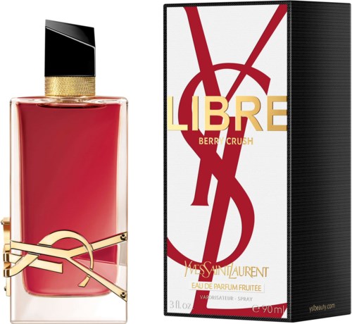 En Yves Saint Laurent parfymeflaske i rødt med svart og gullhette, ved siden av en eske merket 'LIBRE BERRY CRUSH.'