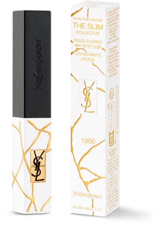 A lipstick in a black and white case with gold accents and Yves Saint Laurent logo, alongside its white box.
