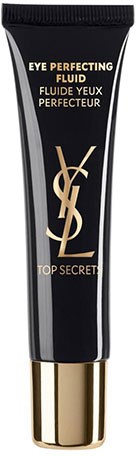 En svart tub märkt Yves Saint Laurent ögonkräm, med guldaccenter och orden "Top Secret" på framsidan.