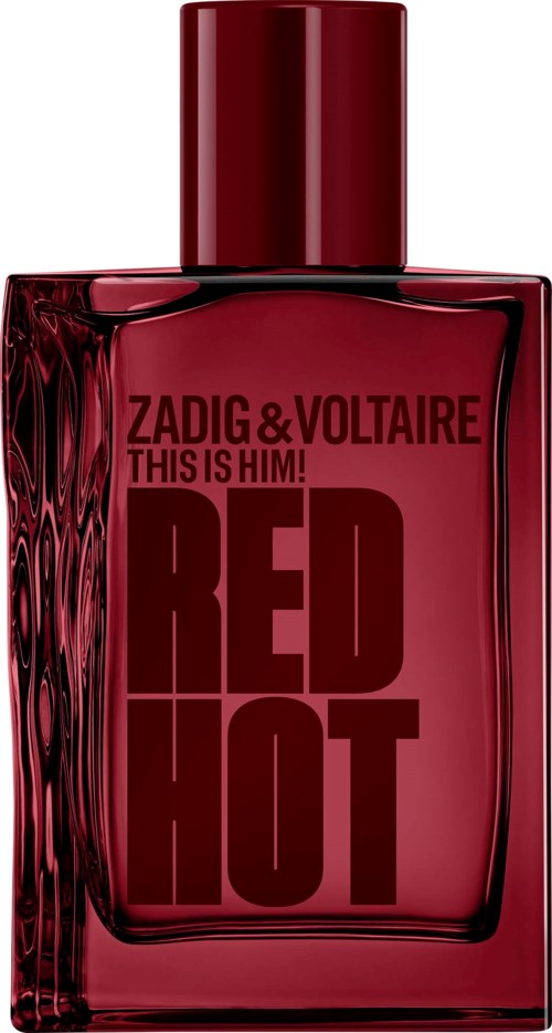 Röd parfymflaska med svart text som säger Zadig & Voltaire Red Hot och This is Him.