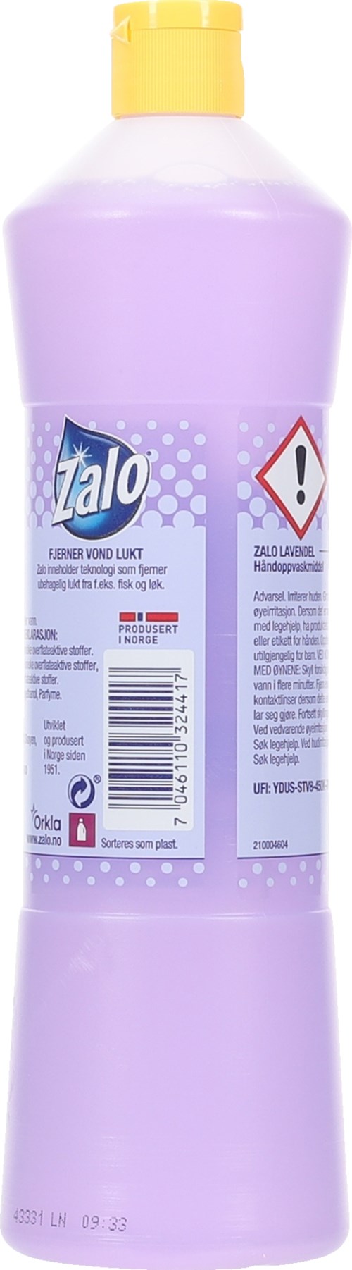 Violetti nestemälikoostepullo keltaisella suuttimella, varoitusmerkki ja viivakoodi etikettissä.