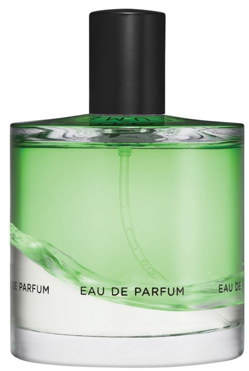En grønn parfymeflaske med svart lokk merket 'Eau de Parfum'.