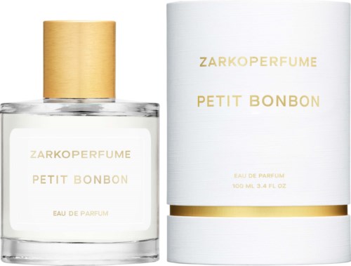 En hvid parfadesign med guldhætte og matchende hvid æske, begge mærket ZARKOPERFUME PETIT BONBON.