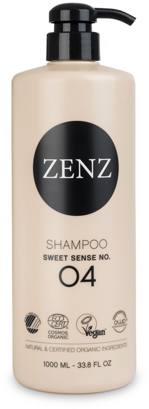 En lång, beige schampoflaska med svart pump. Den har varumärket ZENZ och nämner söt doft och ekologiska ingredienser.
