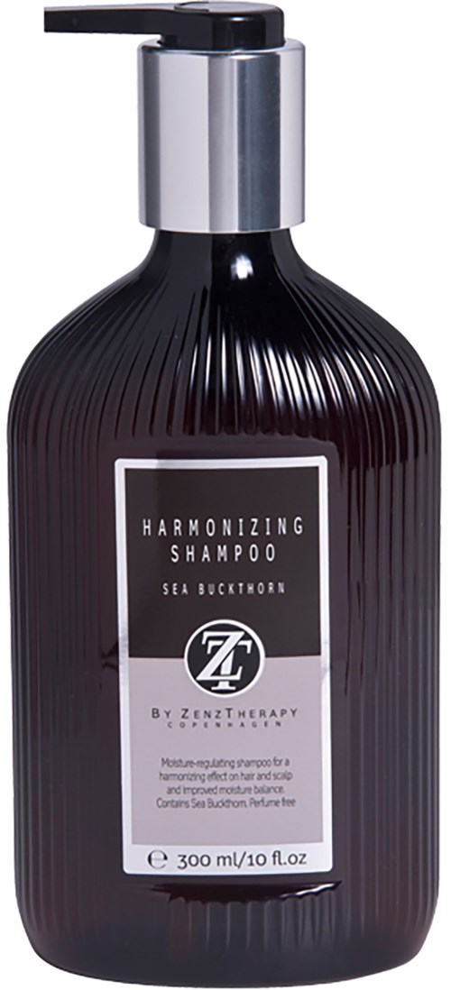 En sort flaske med sølvpumpe mærket som harmoniserende shampoo, indeholder 300 ml havtornschampo.