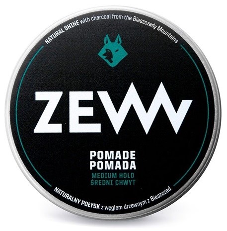 En rund sort beholder med en logo af et blå revhoved og ordet ZEWT i store hvide bogstaver. Den siger pomade, medium hold.