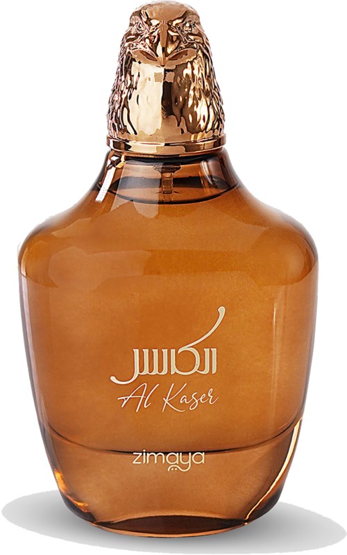 En brun flaska med en glänsande, guldfärgad kork. Den har text på arabiska och engelska, och verkar vara en kosmetisk produkt.