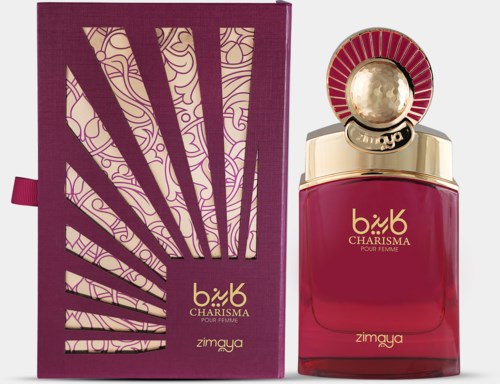 A perfume bottle and box with purple, gold, and red colors. The bottle has a round gold cap and elegant design.