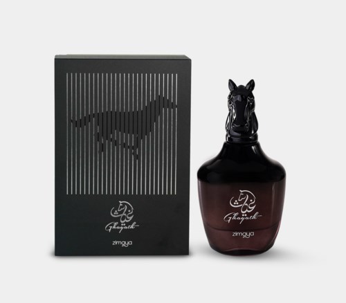 A black box with a horse silhouette and a perfume bottle shaped like a horse head.