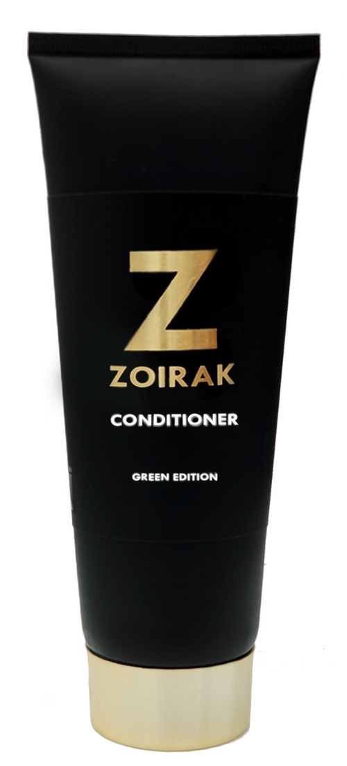 En svart tub med Zoirak-balsam med guldig och vit text, märkt Green Edition.