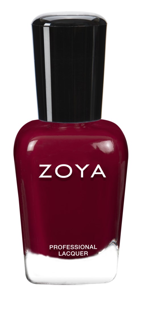 En flaska nagellack i djupröd färg med svart lock, märkt 'ZOYA' och 'PROFESSIONAL LACQUER.'