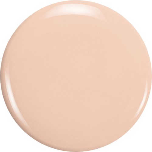 Ett runt föremål i rosa-beige färg med glatt och glänsande yta.