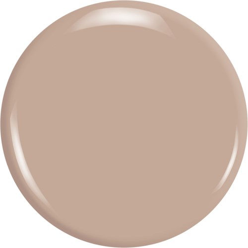 Ett stort runt föremål med slät, glänsande yta, beige färg, ser ut som en polerad sten eller boll.