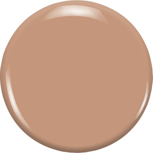 Ett stort, runt, beige makeuppaketet med en glänsande, reflekterande yta.