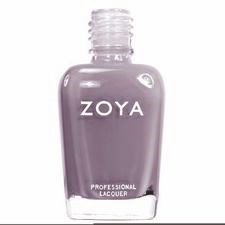 En flaska Zoya professionell nagellack i lila färg med genomskinlig kork.