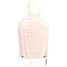 En flaska med Zoya nagellack i ljusrosa färg och vit kork.