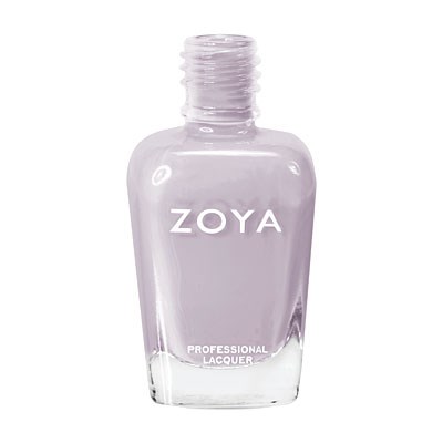 En klar glasflaska för nagellack med vit lock, märkt 'ZOYA' och 'PROFESSIONAL LACQUER'.