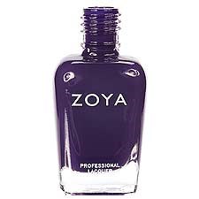 En nagellackflaska märkt Zoya med mörklila färg och svart lock.