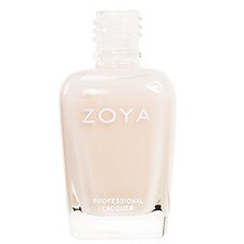 En genomskinlig flaska med vit lock, märkt "ZOYA," troligen nagellack, innehållande en ljusbeige vätska.