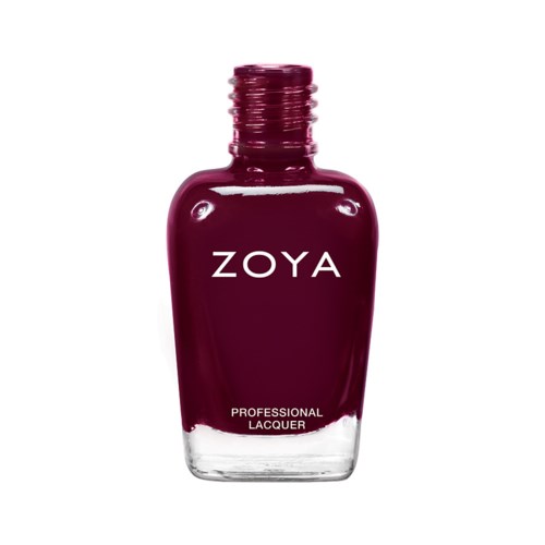 En flaska mörklila nagellack märkta ZOYA, med vit lock och tydligt botten.