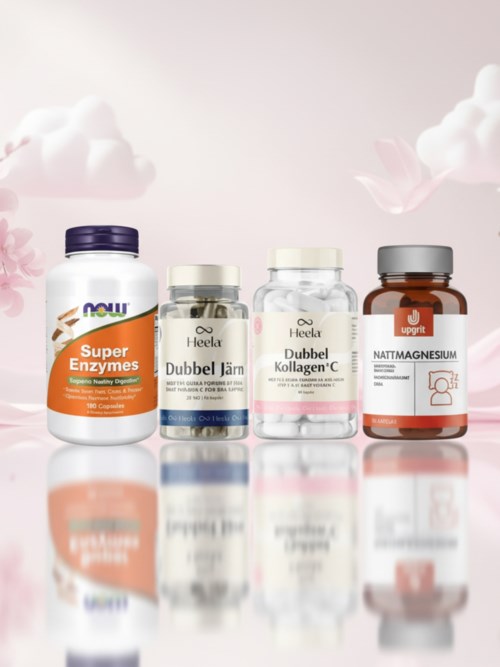 Fyra kosttillskottsflaskor med olika etiketter är placerade i rad på en reflekterande yta, med en mjuk rosa och vit bakgrund.