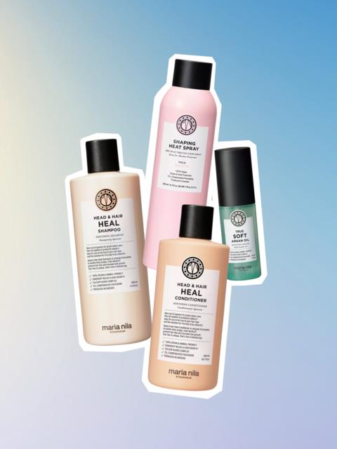 Vier haarverzorgingsproducten van Maria Nila, inclusief shampoo, conditioner, hittespray en stylingmousse, met zichtbare etiketten.