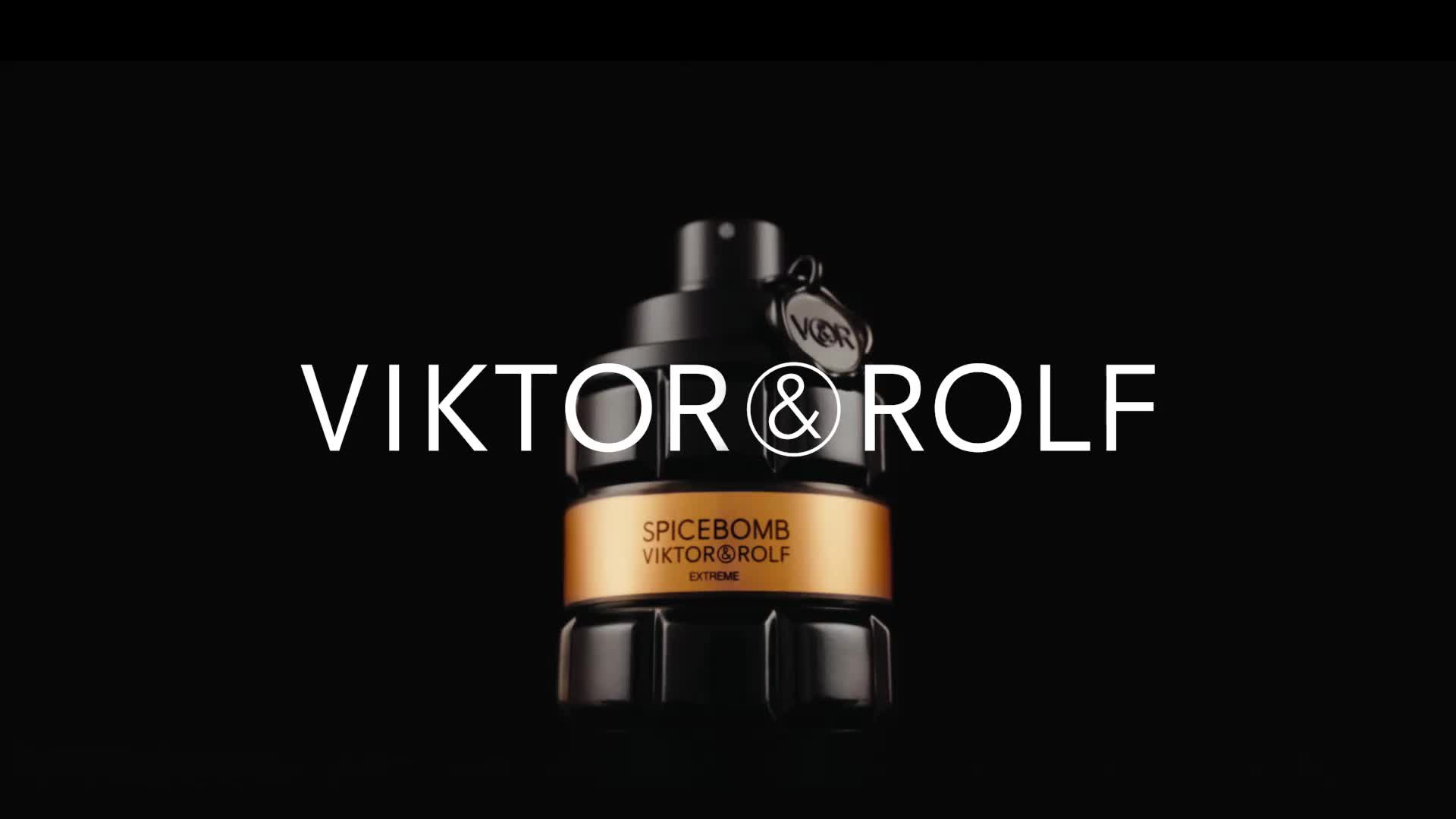 Viktor & Rolf Spicebomb hajuvesi pullo, musta tausta ja kultainen tarra.